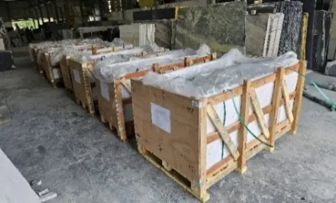 Crates loaded inside a shipping container