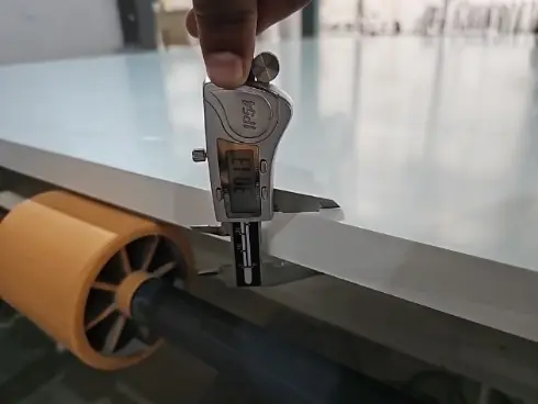 Checking slab thickness with a measuring tool